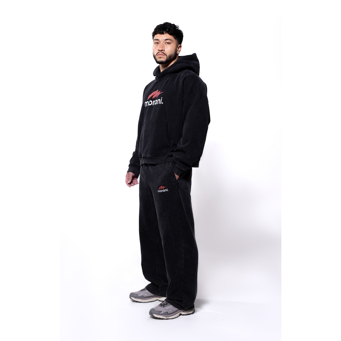 Morani oversized black hoodie worn on model side view